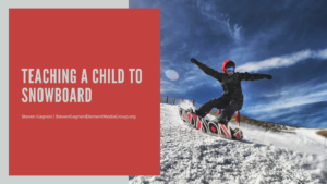 Teaching A Child To Snowboard